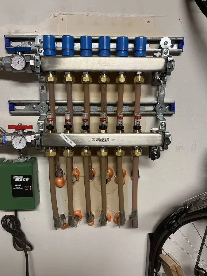 Plumber performing Water Heater Repair at a residential property in Dale City